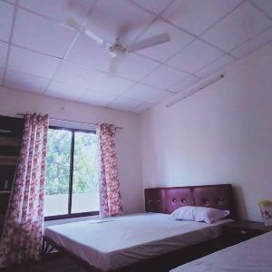 Manikarnika Cottages Triple Bed Room